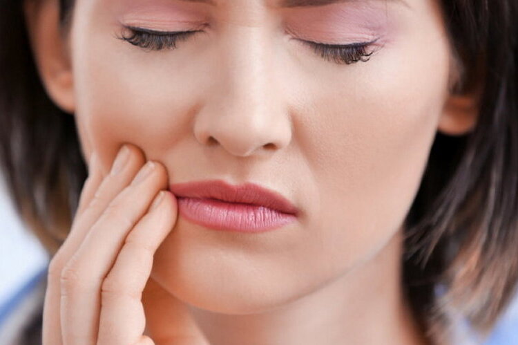 Why does a dead tooth hurt?